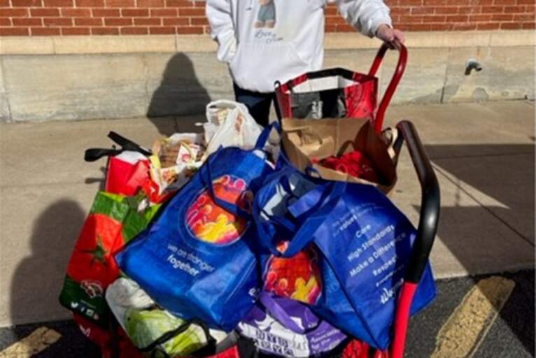 Trinity Volunteers Share Their Mission at Gerard Place Poster